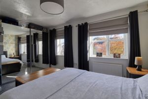 Bedroom One- click for photo gallery